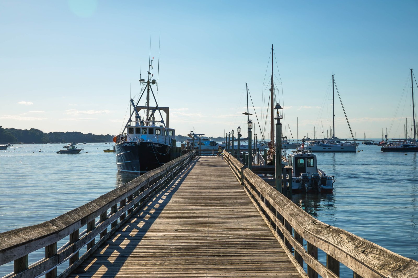Start with the harbor walk for an instant “Port Jefferson” feel