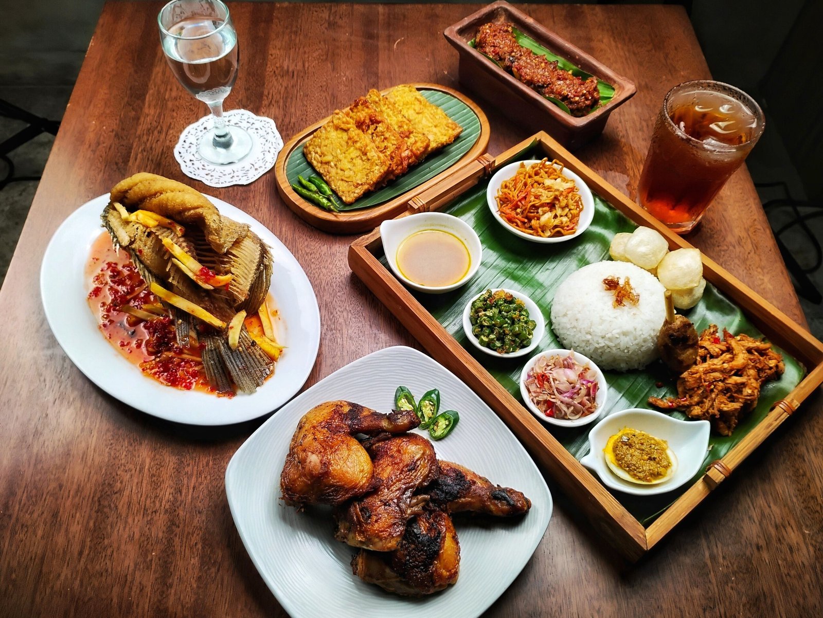 Try classic flavors: grilled fish, hearty staples, and chili sauces